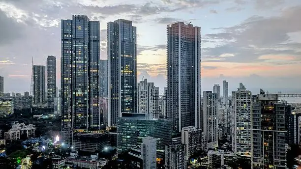 High-rise residential building representing increased property value after redevelopment in Bhayandar